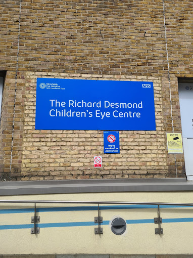 Richard Desmond centre sign