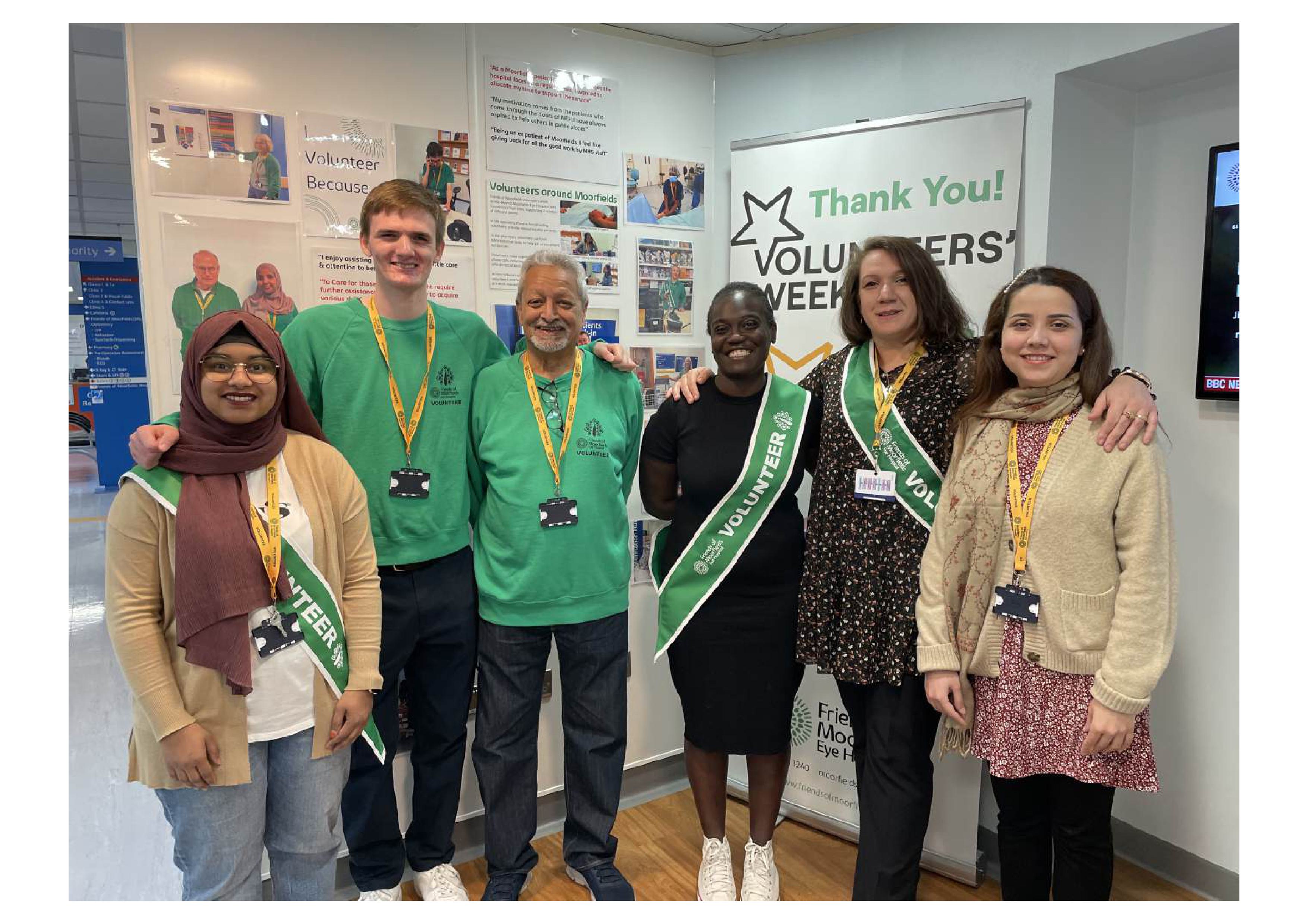 Friends of Moorfields volunteers smiling to camera