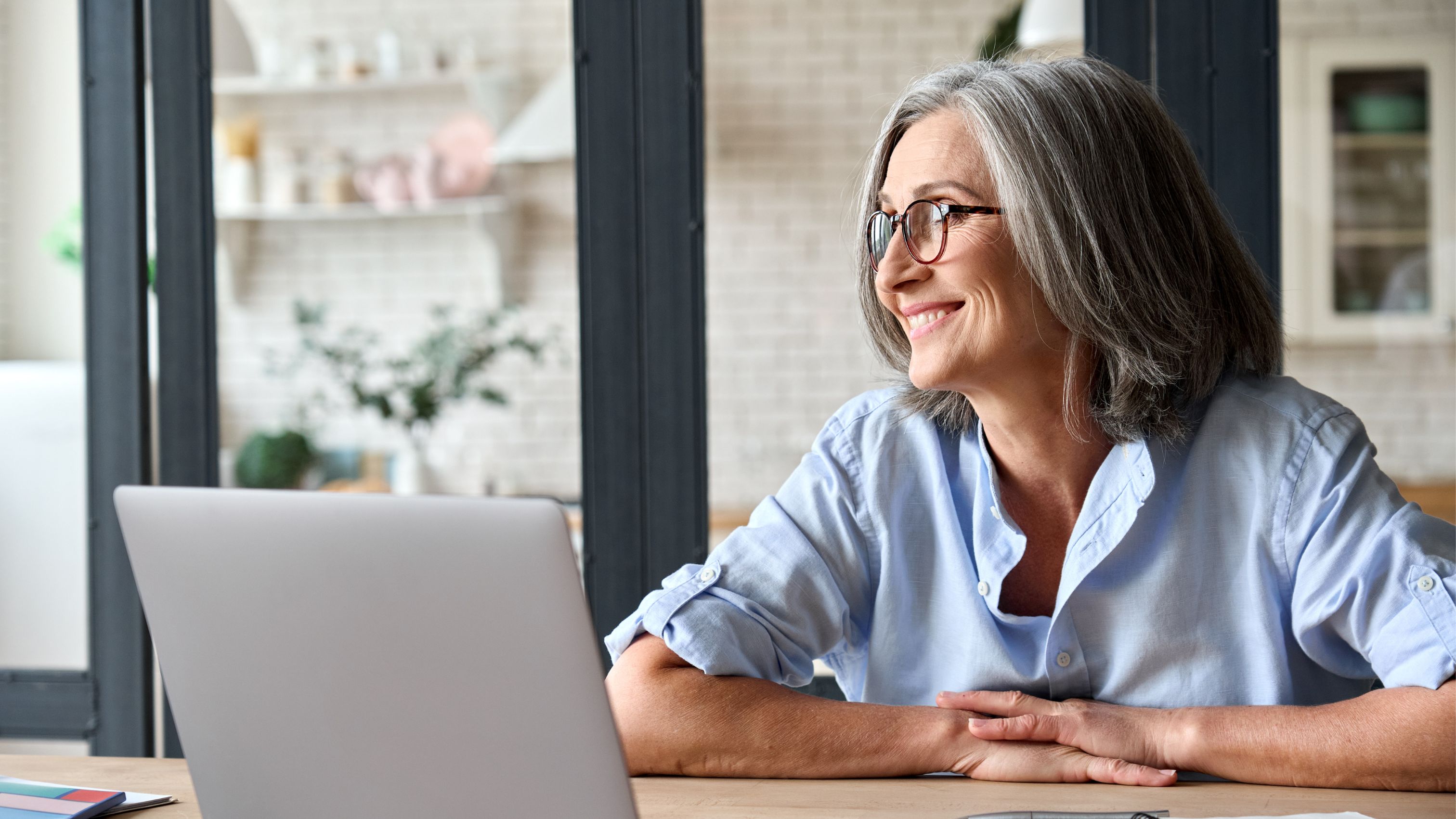 Woman at home with computer