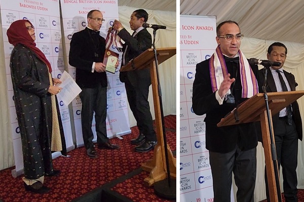 Consultant standing at a podium receiving an award