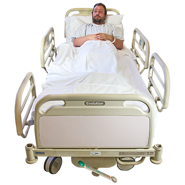 Person laying in a hospital bed with the sides put up