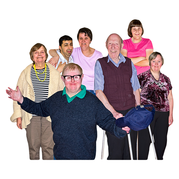 A diverse group of seven smiling people standing together 